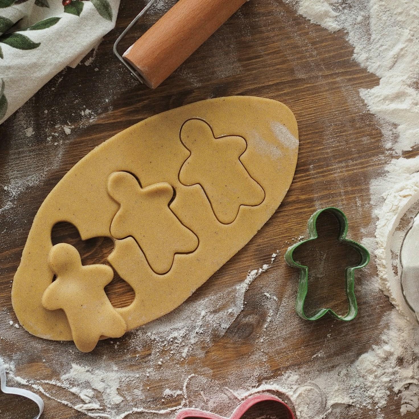 Community members collaborating in a modern kitchen space, sharing recipes and cooking techniques